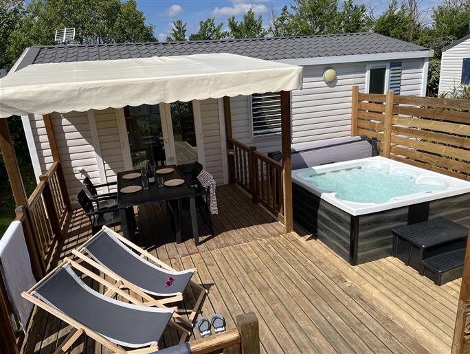 Mobilheim Cottage zu vermieten 3 Schlafzimmer Whirlpool Spa Campingplatz Kost Ar Moor Fouesnant Bretagne